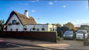 Retired Couple Restores 18th-Century Thatched Cottage with Timeless Charm